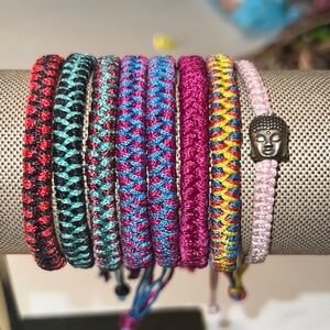 Set of 8 adjustable tightly braided collectible travel bracelets multi colored​​